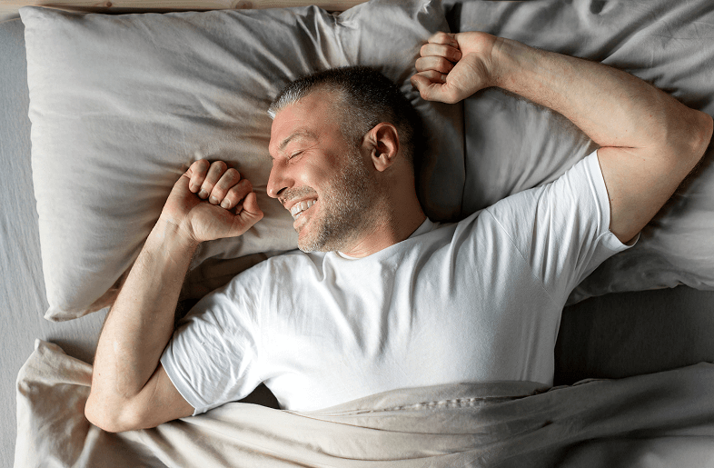 Man waking up energized
